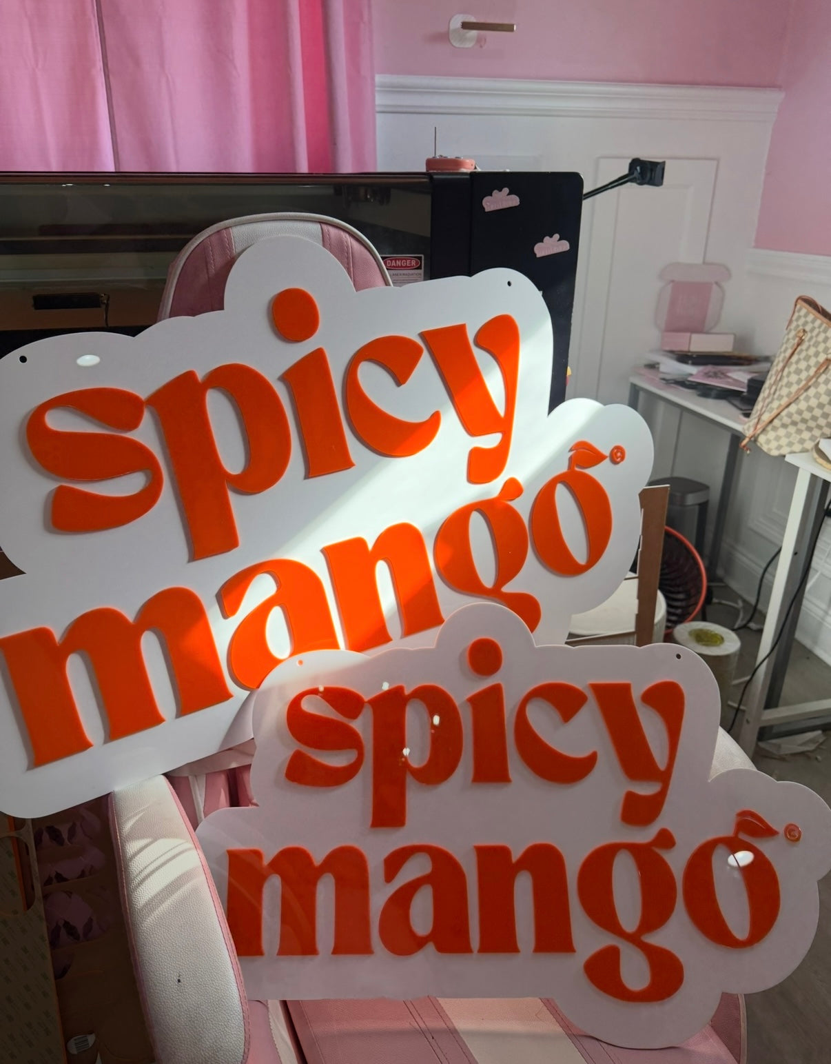 cut to shape logo sign.
