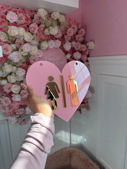 bathroom heart sign